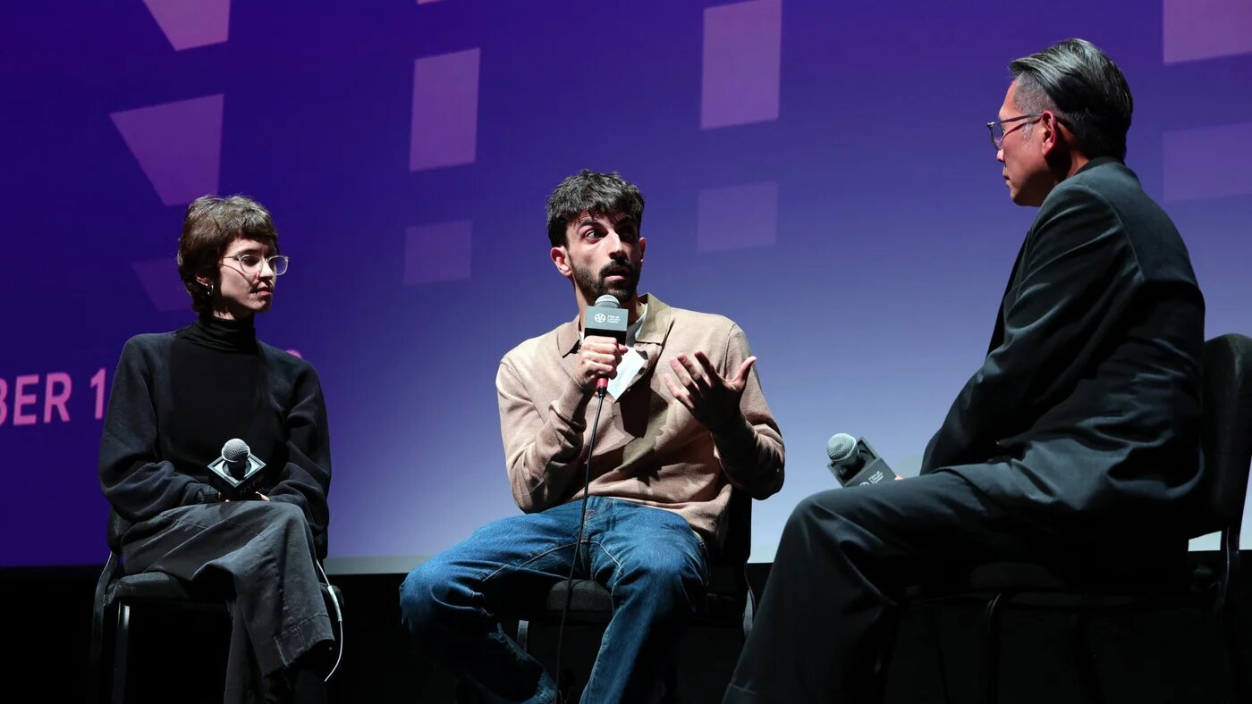 Rachel Szor and Yuval Abraham, with the festival's artistic director Dennis Lim, speak onstage at the premiere of Naza at the New York Film Festival on 26 September 2026 (Dimitrios Kambouris/Getty Images via AFP)