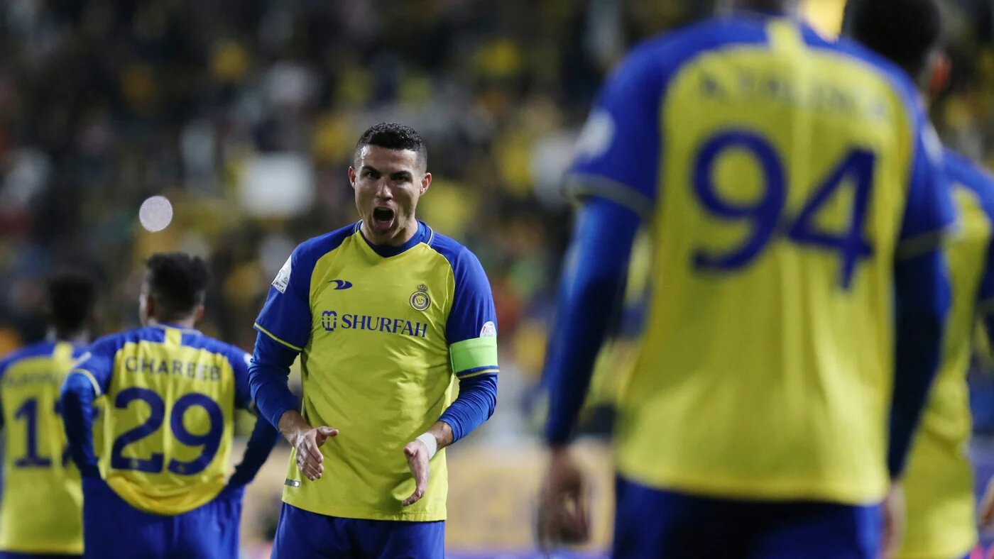 Al Nassr's Cristiano Ronaldo celebrates after teammate Anderson Talisca scores against Al Ettifaq FC in the Saudi Pro League match in Riyadh's Mrsool Park on 22 January 2023 (Rueters)