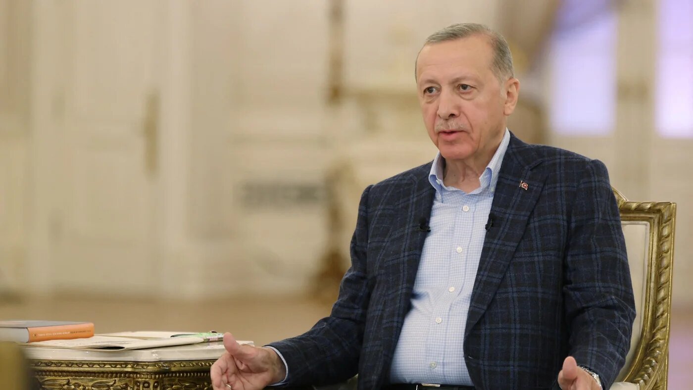 Turkey's President Recep Tayyip Erdogan speaks during a joint live broadcast of Turkish TV channels in Ankara, where he announced the operation in Syria (Reuters)