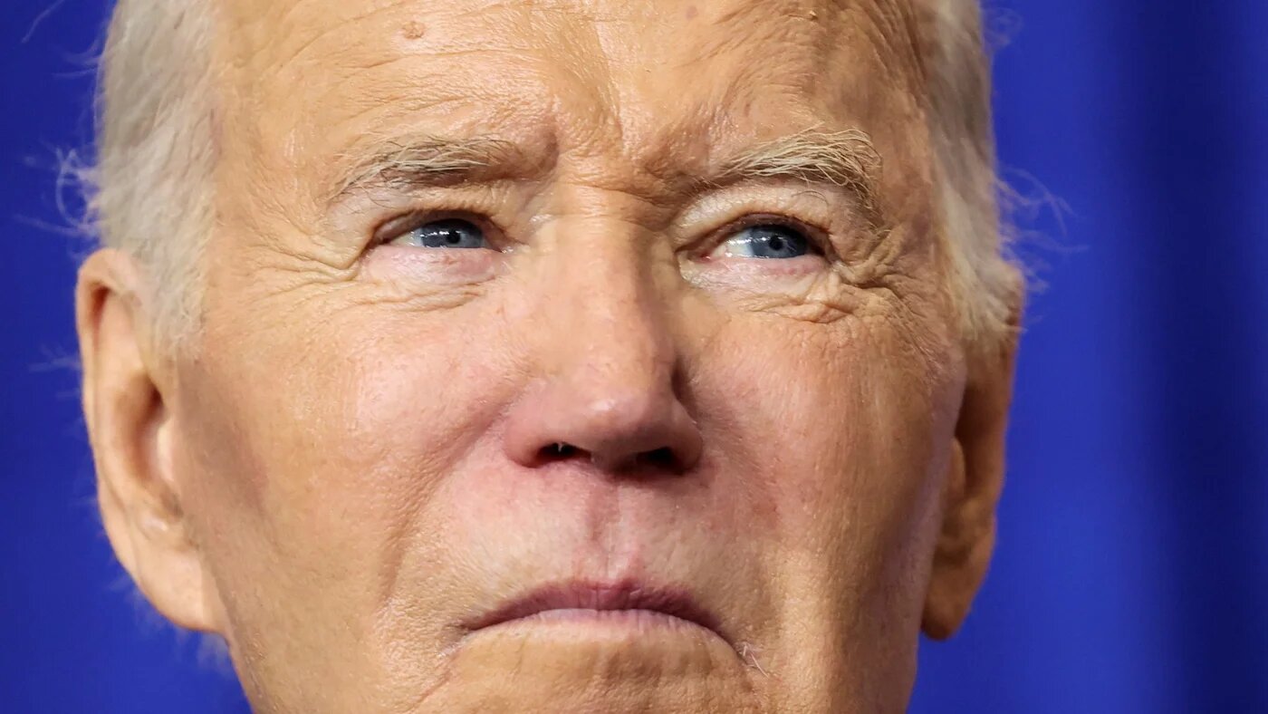 US President Joe Biden looks on as he visits the Department of Labor for an event in Washington on 16 December, 2024. (Kevin Lamarque/Reuters)