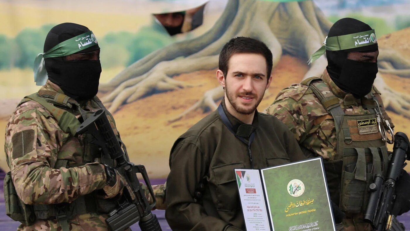 Omer Shem Tov, an Israeli captive held in Gaza since the 7 October 2023 attack, is released as part of a ceasefire and a prisoner swap deal between Hamas and Israel in Nuseirat, central Gaza Strip, on 22 February 2025 (Reuters/Ramadan Abed)
