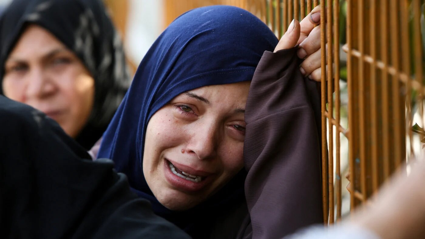A mourner reacts during the funeral of Palestinians killed by Israeli forces, at Nasser hospital, in Khan Younis, in the southern Gaza Strip, 1 June 2025 (Reuters/Hatem Khaled)