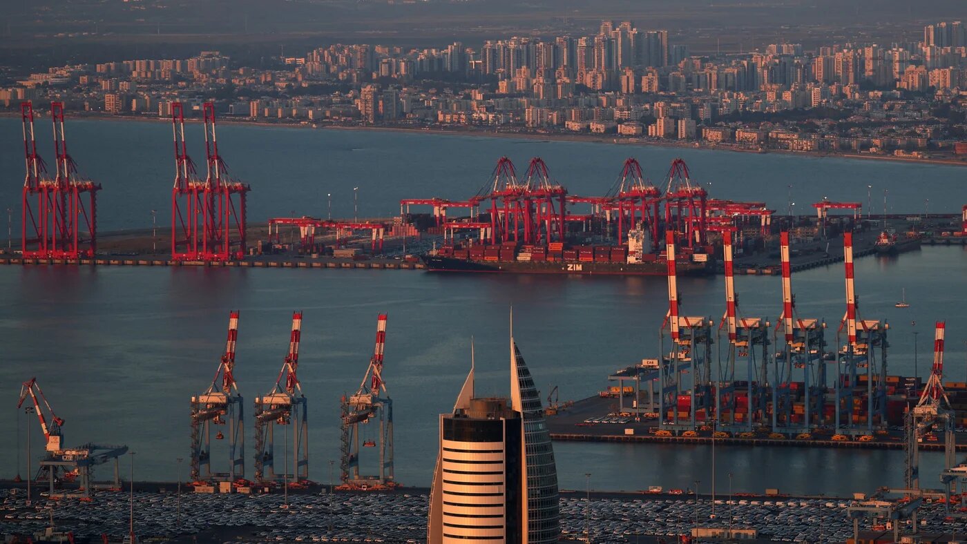 A container ship is docked at the Port of Haifa, Israel’s main Mediterranean gateway for industrial and strategic imports, 27 June 2025 (Florion Goga/Reuters)