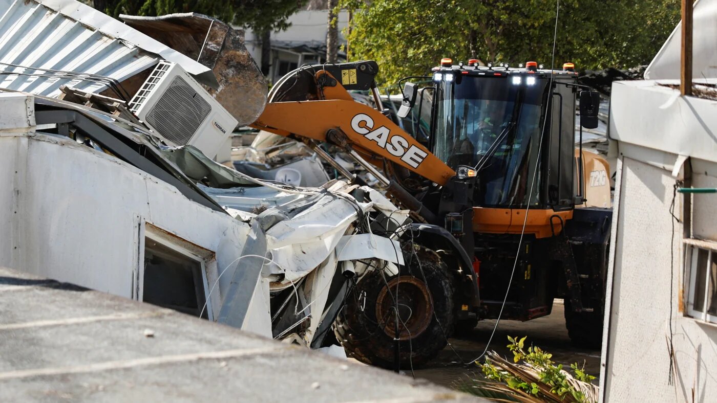 Heavy machinery operates as Israeli forces dismantle the Jerusalem headquarters of the United Nations Relief and Works Agency for Palestine Refugees (UNRWA), in East Jerusalem, 20 January 2026 (Reuters/Ammar Awad)