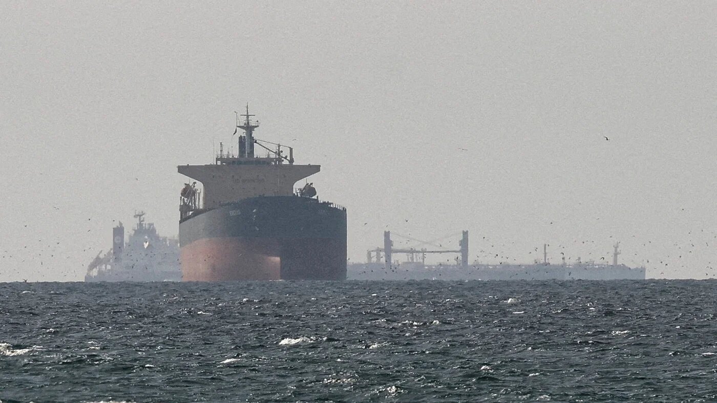 Cargo ships in the Gulf near the Strait of Hormuz, through which much of the world’s energy supplies pass, amid escalating confrontation between Iran and the United States, on 11 March 2026 (Reuters)