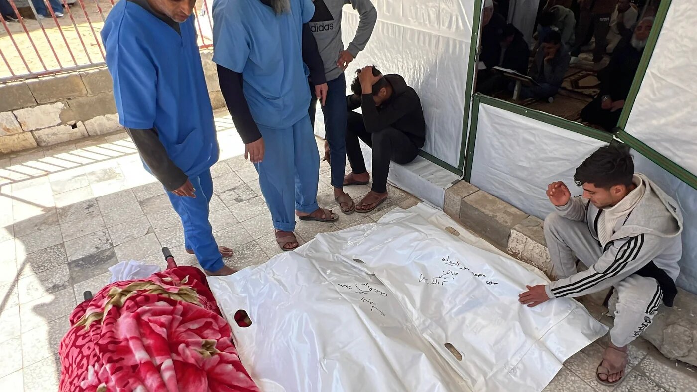 Palestinians bid farewell to two people killed in an Israeli drone strike at Nasser Hospital in Khan Younis, southern Gaza Strip, on 31 March 2026 (Tariq Mohammad/APA Images via Reuters)