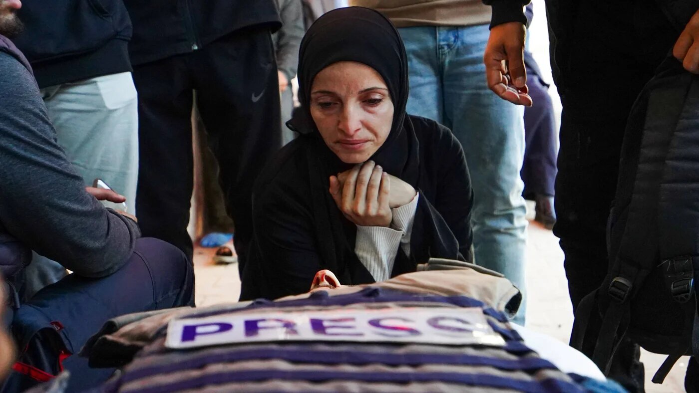 Mourners attend the funeral of Al Jazeera journalist Mohammad Weshah, who was killed in an Israeli strike, at Al-Aqsa Martyrs Hospital in Deir al-Balah 9 April 2026 (Ramzi Abu Amer/IMAGO/APAimages via Reuters)