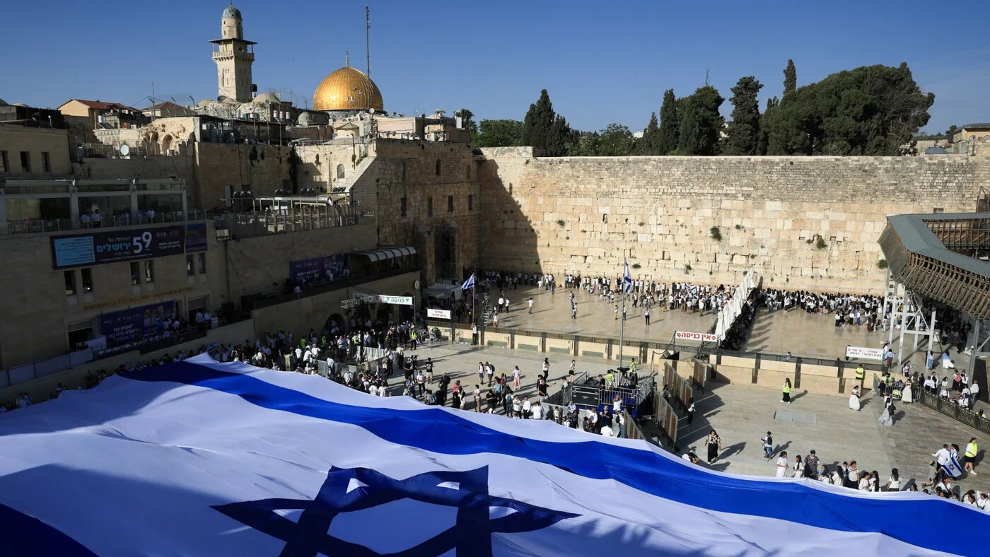 A large Israeli flag at the Western Wall Plaza, Judaism's holiest prayer site, during the annual Jerusalem Day, in Jerusalem's Old City, May 14, 2026 (Ronen Zvulun/Reuters)