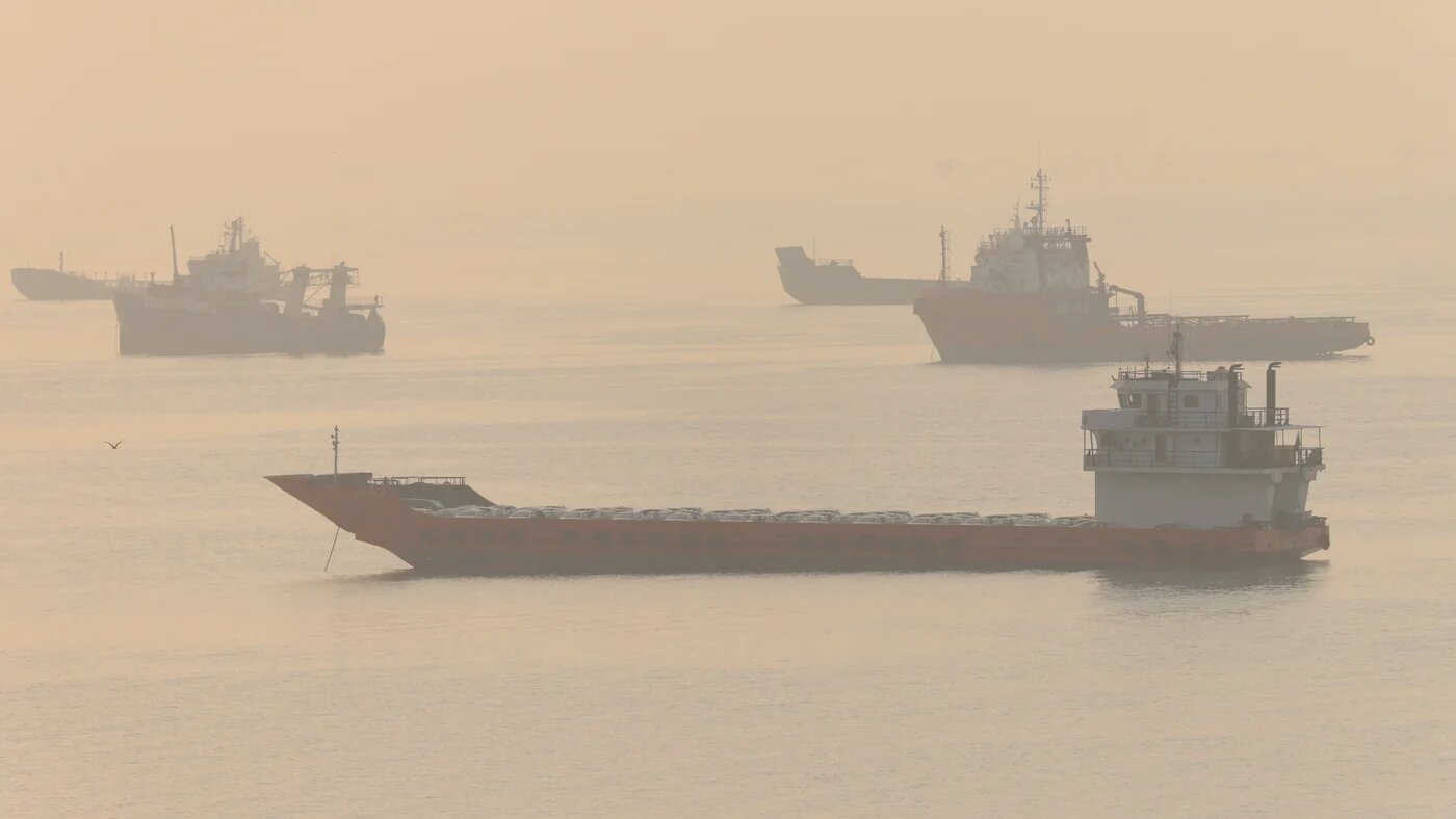 Vessels sit in the Strait of Hormuz near Bandar Abbas, Iran, on 28 September 2026, a week after commercial crossings of the strait fell to two in a single day (Amirhosein Khorgooi/ISNA/WANA via Reuters)