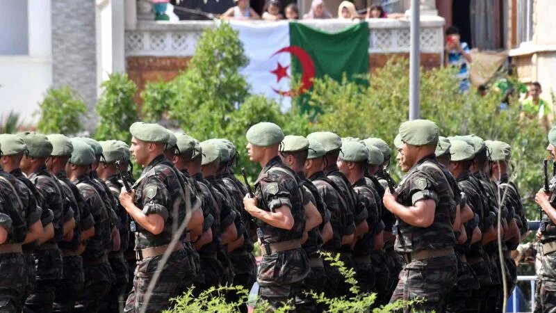 Algerian soldiers at a military parade in Algiers, on 5 July 2022, as the country celebrates the 60th anniversary of its independence (AFP)