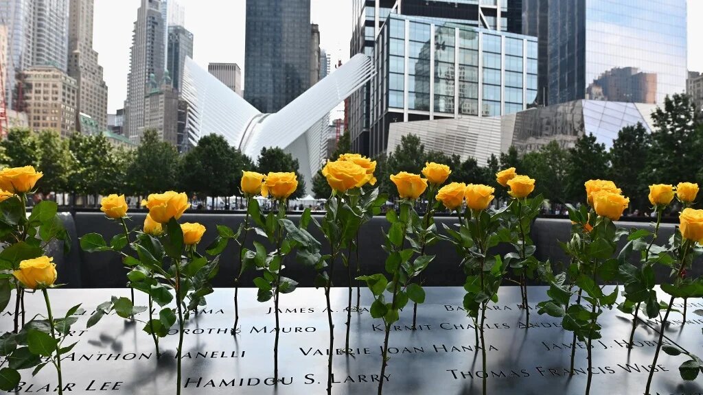 Flowers placed at the 9/11 Memorial & Museum in New York on 11 September 2020