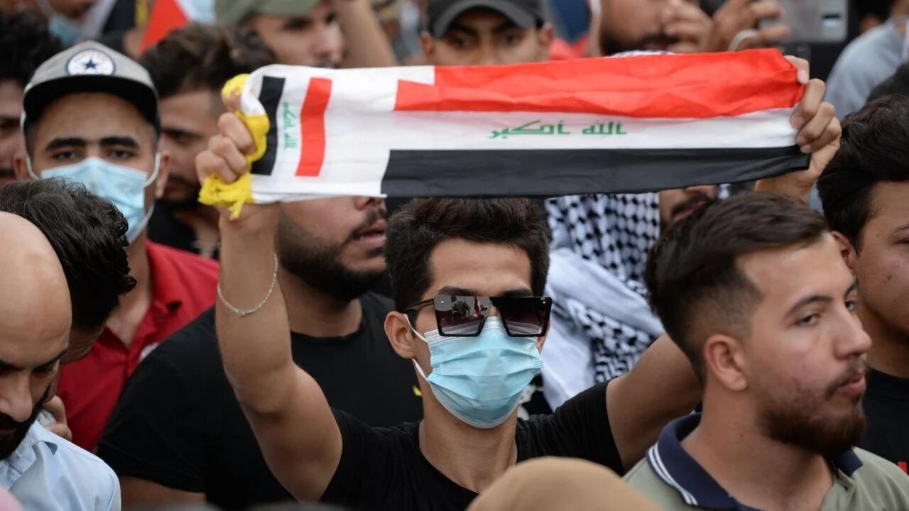 Protesters poured into Tahrir Square to commemorate the first anniversary of Iraq's demonstration.