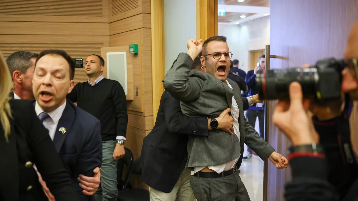 A handout from the Israeli parliament, Knesset, showing opposition deputies protesting a controversial judicial reform bill in Jerusalem on 13 February 2023 (Anadolu Agency)