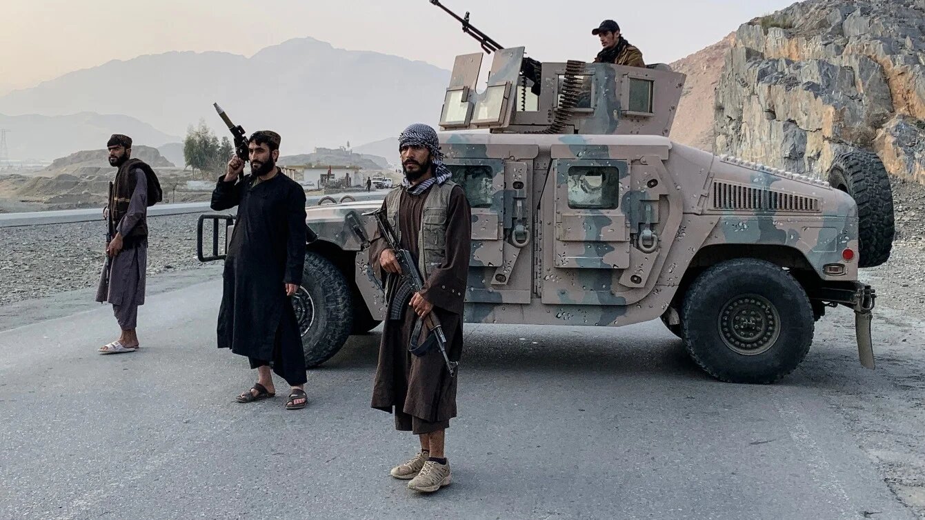 Taliban personnel deployed near the Torkham border crossing between Afghanistan and Pakistan in the Nangarhar province on 27 February 2026 (Aimal Zahir/AFP)