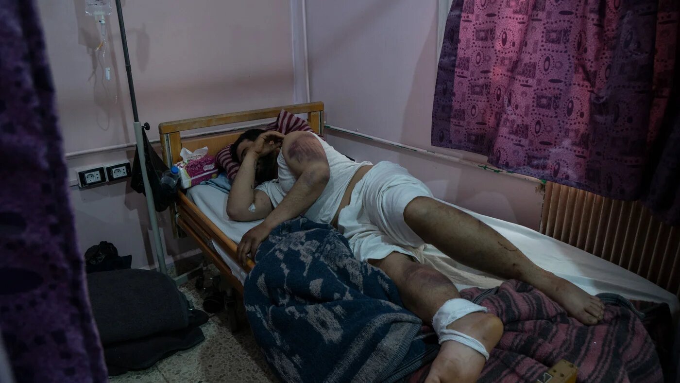 Zakaria Qastal, lying on a treatment bed in Bab Al-Hawa Hospital on March 12, 2023 (MEE/Ahmad Fallaha)