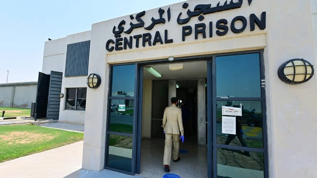 A policeman enters Dubai's Al-Awir central prison in the United Arab Emirates