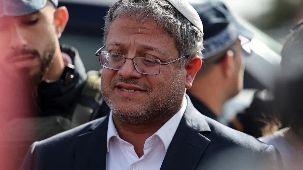 Israeli far-right minister Itamar Ben-Gvir speaks to the press at the scene of a shooting attack in the southern town of Kiryat Malakhi on 16 February 2024 (Ahmad Gharabli / AFP)