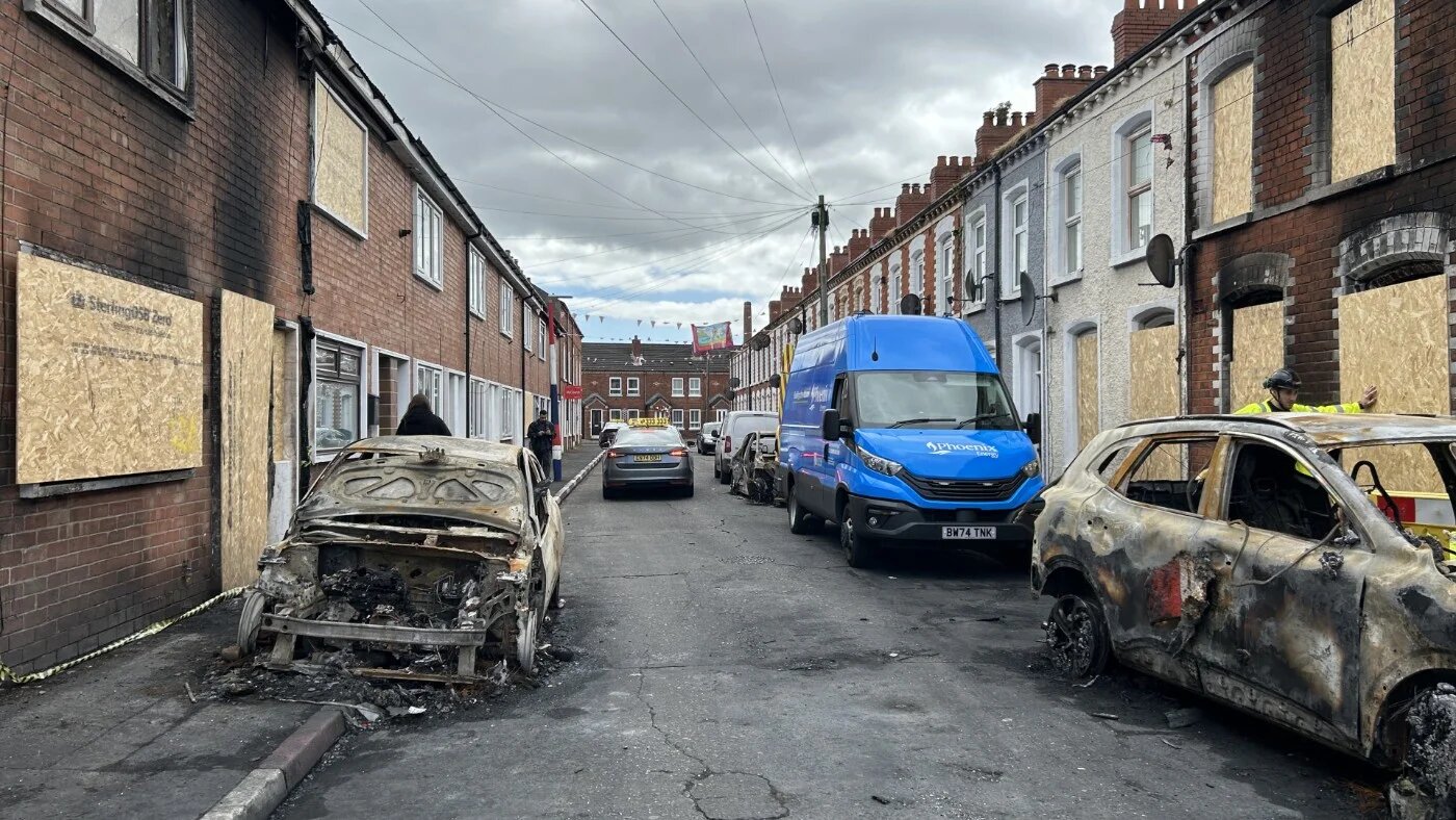 A street in east Belfast on 12 June 2026, after homes were attacked and cars burned during the race riots (Oscar Rickett/MEE)