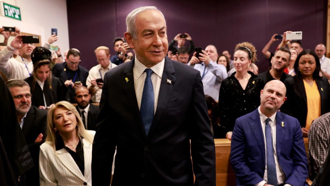 Israeli Prime Minister Benjamin Netanyahu attends a hearing in his trial on corruption charges at the district court in Tel Aviv on 10 December 2024 (Menahem Kahana/Reuters)