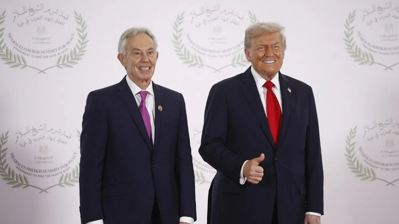 US President Donald Trump (R) and former British Prime Minister Tony Blair pose during a summit on Gaza in Sharm el-Sheikh on 13 October 2025 (Yoan Valat/AFP)