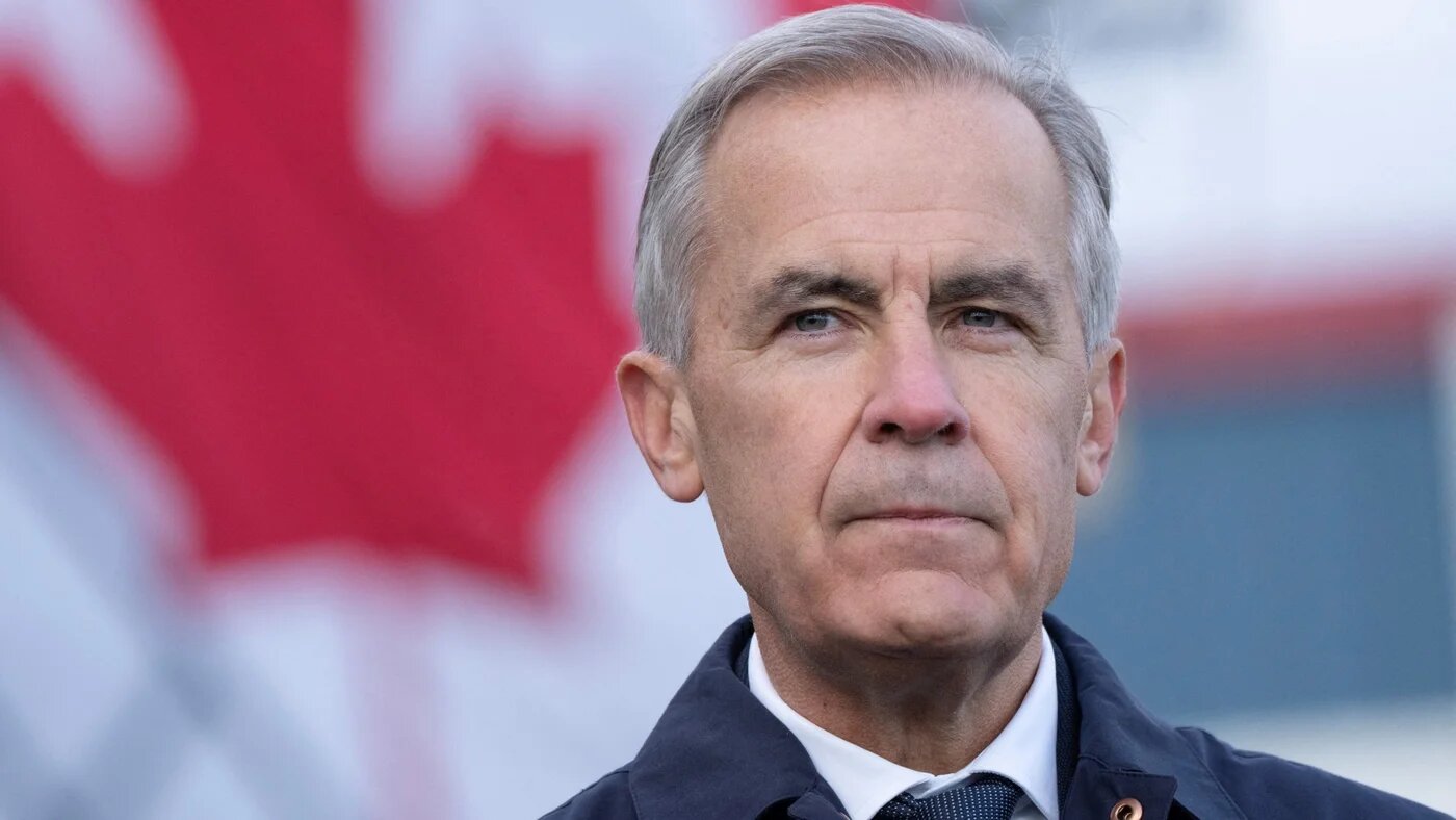 Canadian Prime Minister Mark Carney reacts as he announces the next step to accelerate a major infrastructure project in Fort McMurray, Alberta, Canada, October 1, 2026. REUTERS/Todd Korol
