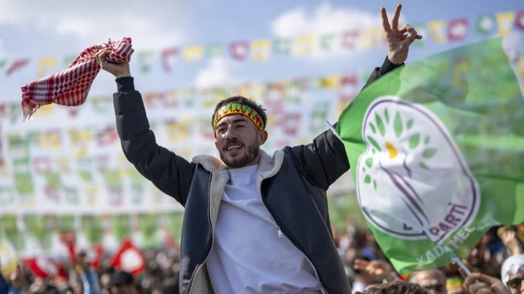Supporters of the Pro-Kurdish Peoples' Equality and Democracy Party (DEM) take part in the Kurdish celebration of Nowruz in Istanbul on 17 March (AFP/Yasin Akgul)