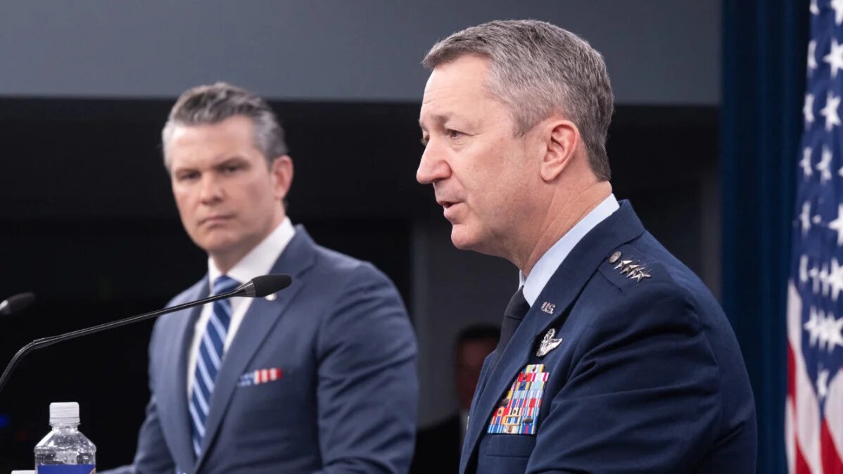 US Secretary of Defence Pete Hegseth looks on as Chairman of the Joint Chiefs of Staff General Dan Caine speaks during a press briefing at the Pentagon on 16 April 2026 (Saul Loeb/AFP)