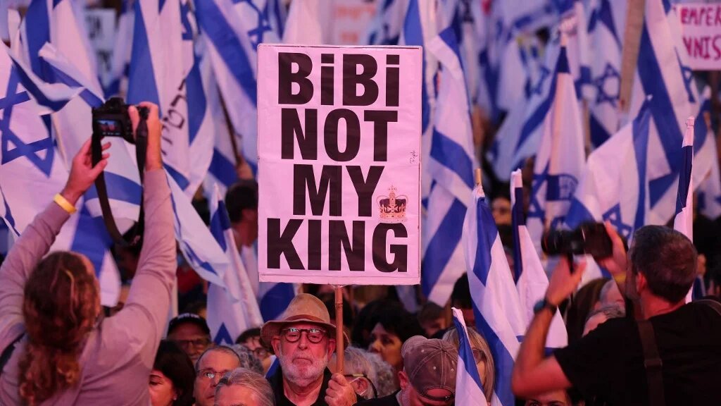 Demonstrators gather to protest against the Israeli government's judicial overhaul bill, in Tel Aviv on 6 May 2023 (AFP)