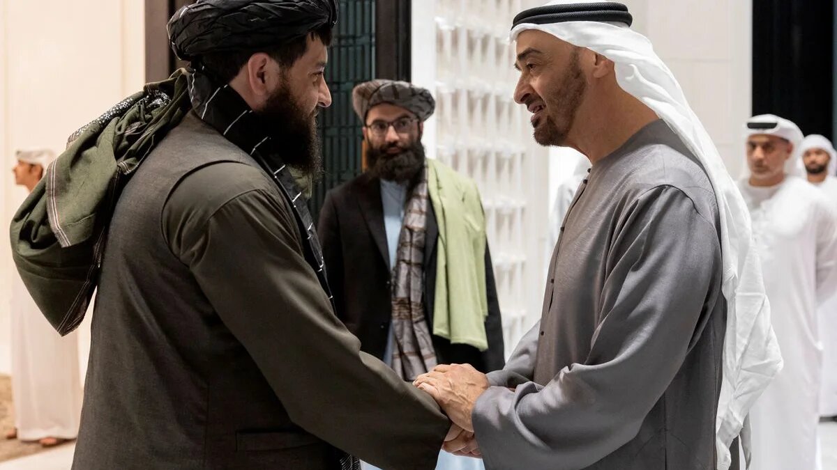 Mohammed bin Zayed bids farewell to Afghanistan's acting Defence Minister Mullah Mohammad Yaqoob at al-Shati Palace in Abu Dhabi (Reuters)
