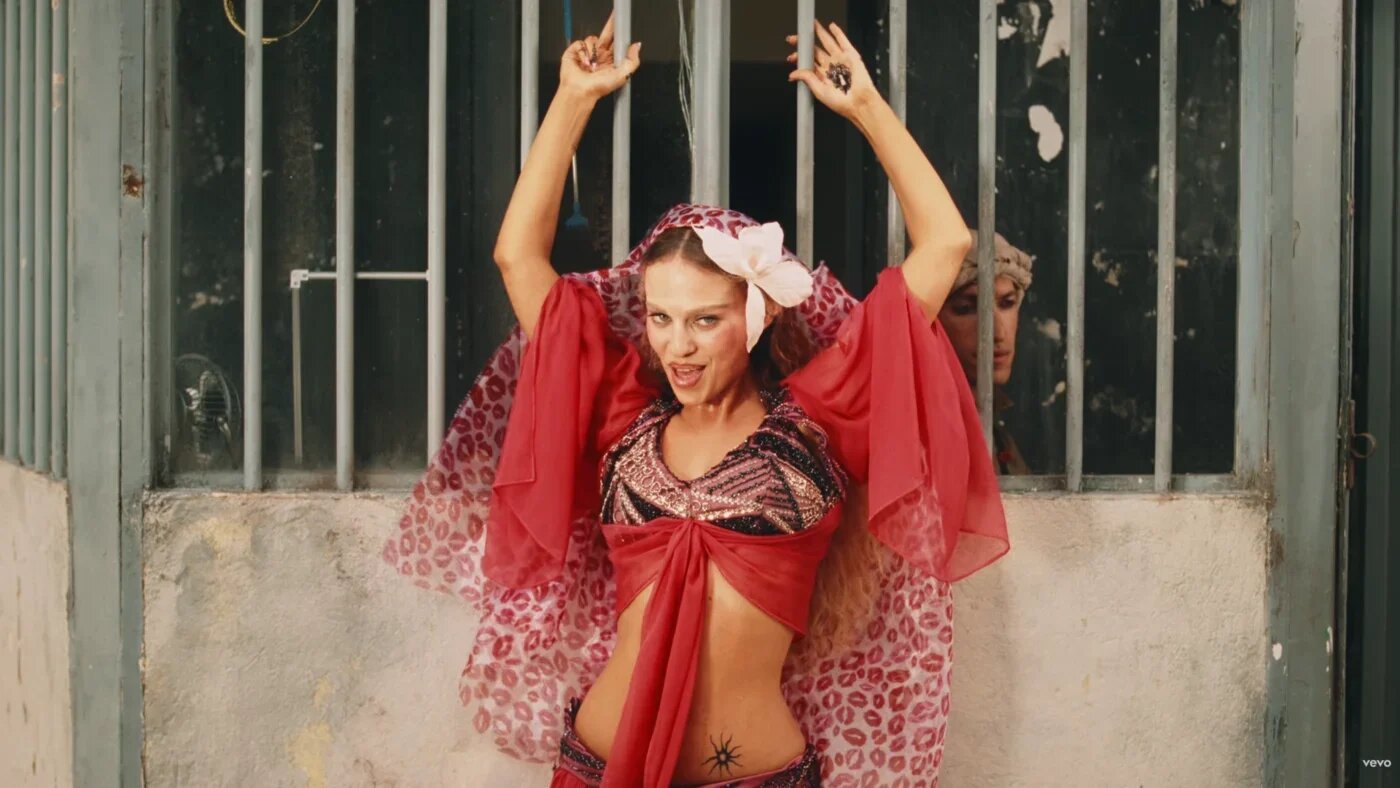 Elyanna features in a scene from her “BOSA” music video, which has drawn criticism over its use of prison imagery (Screenshot/YouTube)