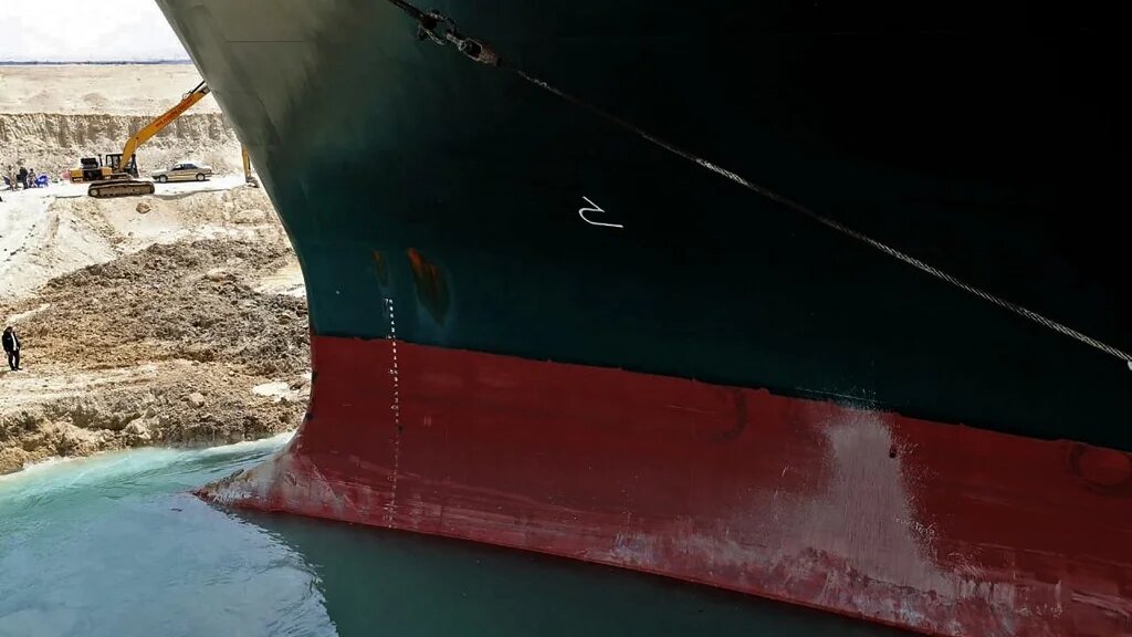 Rescue teams have been working for days to dislodge the Panama-flagged ship by removing sand and mud from around the port side of the vessel’s bow (AFP photo/HO/Suez Canal)