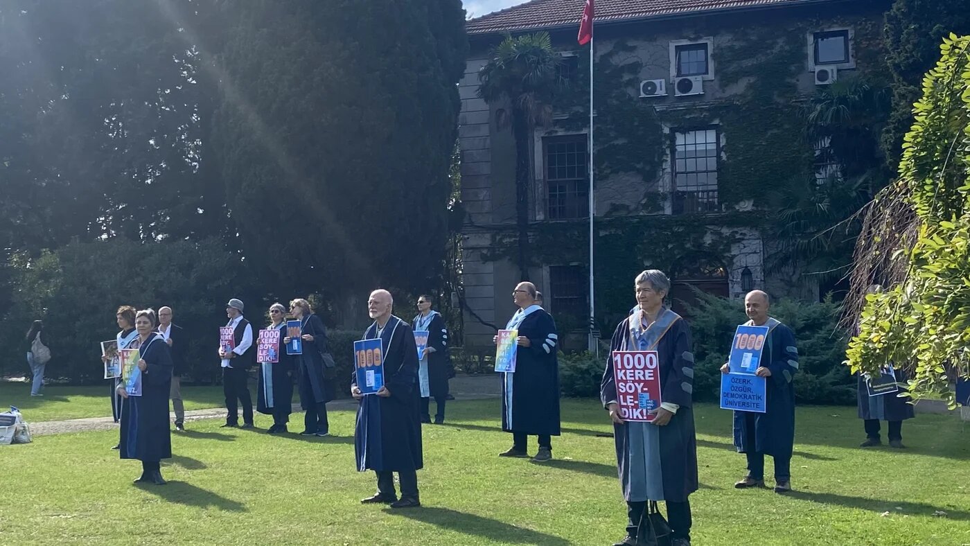 Members of the Bogazici faculty stand in the quadrangle outside the rector's office (Can Candan)