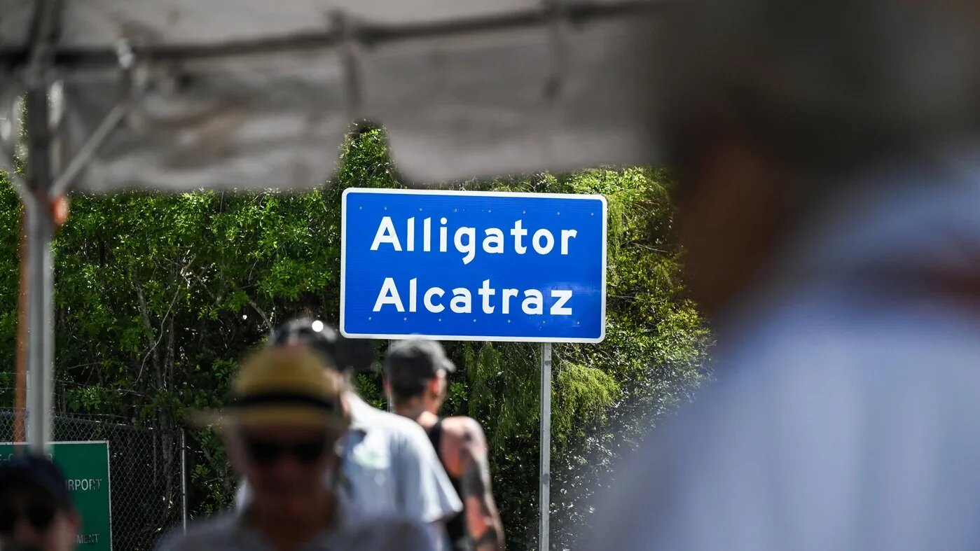 People demonstrate outside the immigrant detention centre known as "Alligator Alcatraz" in Ochopee, Florida, on 16 August (Chandan Khanna/AFP)
