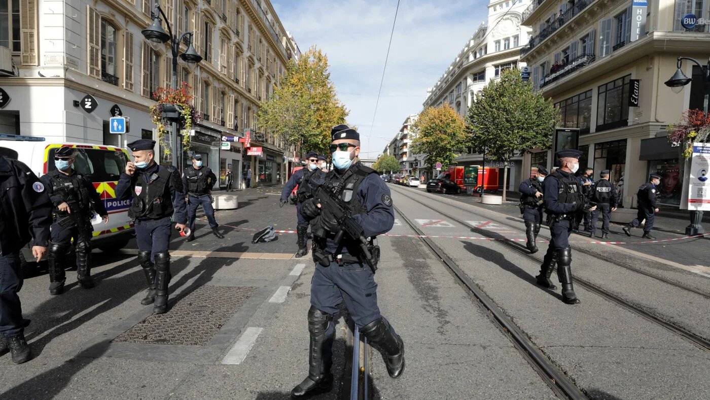 French security forces guard the area after a reported knife attack at Notre Dame church in Nice, France