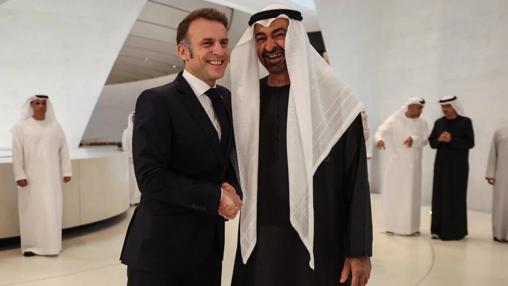 France's President Emmanuel Macron (L) meets with UAE's President Mohammed bin Zayed Al Nahyan during a visit to the Zayed National Museum in Abu Dhabi, in the United Arab Emirates, on 21 December 2025 (Ludovic Marin/AFP)