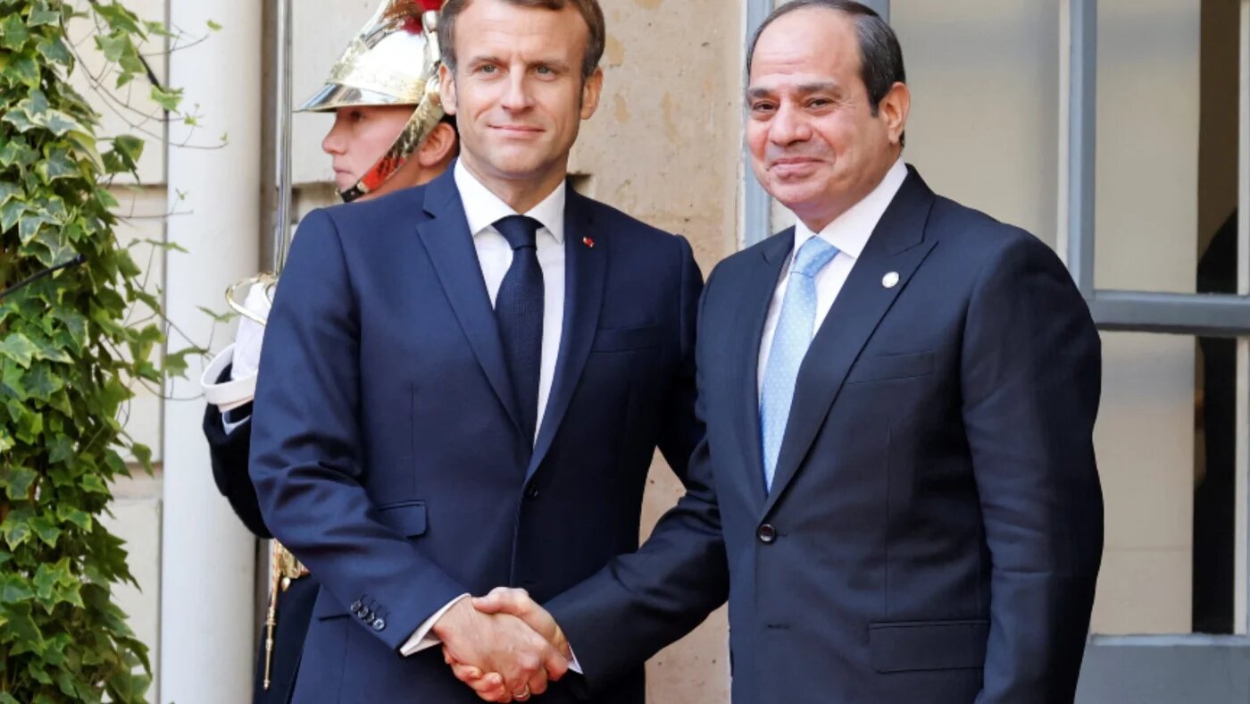 French President Emmanuel Macron, the current president of the EU Council, with Egyptian President Abdel Fattah el-Sisi in Paris in November 2021 (AFP)