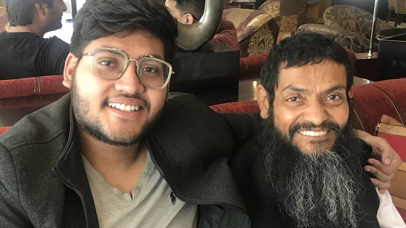 Ahmed Rabbani (R) meets his son, Jawad (L) for the very first time, in Karachi, after spending 20 years in the US's Guantanamo Bay detention facility (Clive Stafford Smith)
