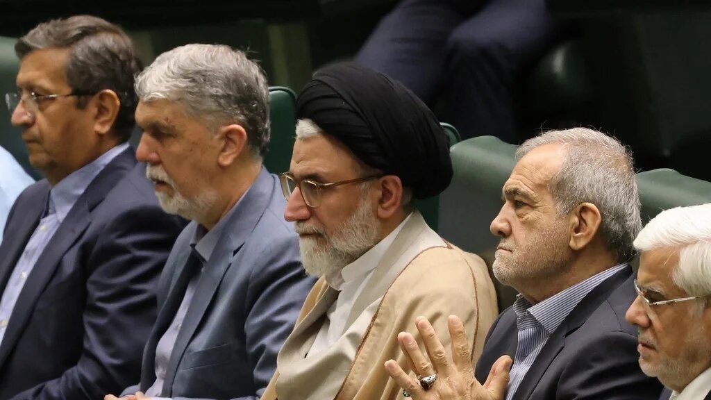 Iran's Minister of Intelligence Esmail Khatib (C) sits with Iran's President Masoud Pezeshkian (C-R) in Tehran on 17 August 2024 (AFP)
