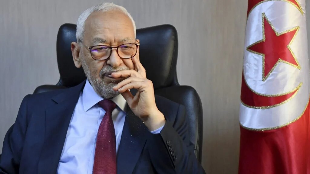 In this file photo, Rached Ghannouchi, former head of the Ennahdha party, answers questions during an interview with AFP at his office in Tunis on 31 March 2022 (AFP)