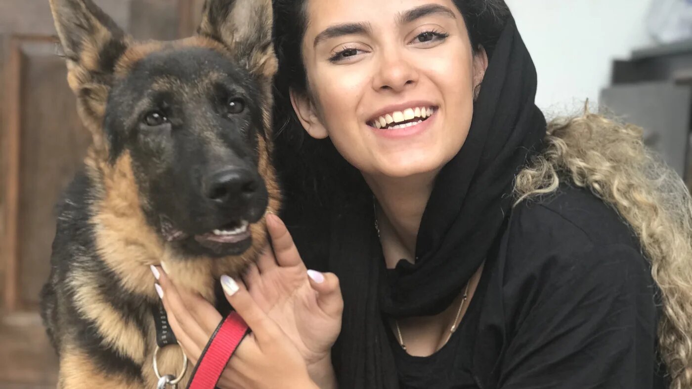 Iranian woman and her dog during pandemic MEE