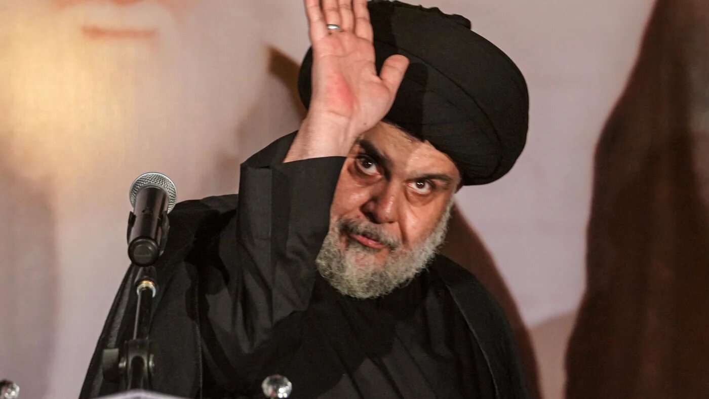 Muqtada al-Sadr, speaking in Najaf, on 3 June. One onlooker described the cleric as being "at the height of his glory" prior to his withdrawal from politics (AFP)