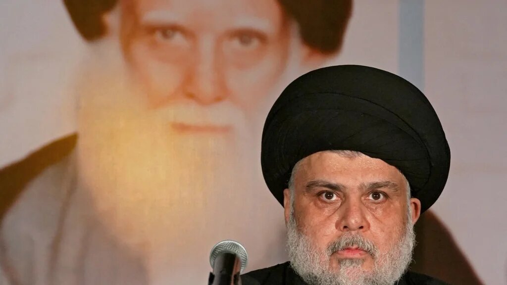 Iraqi Shia cleric Muqtada al-Sadr delivers a speech in the Iraqi city of Najaf on 3 June 2022 (AFP)
