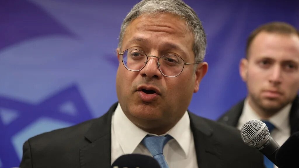 Israeli Minister of National Security Itamar Ben-Gvir speaks to the media ahead of the weekly cabinet meeting in the prime minister's office in Jerusalem, 19 March 2023 (AFP)