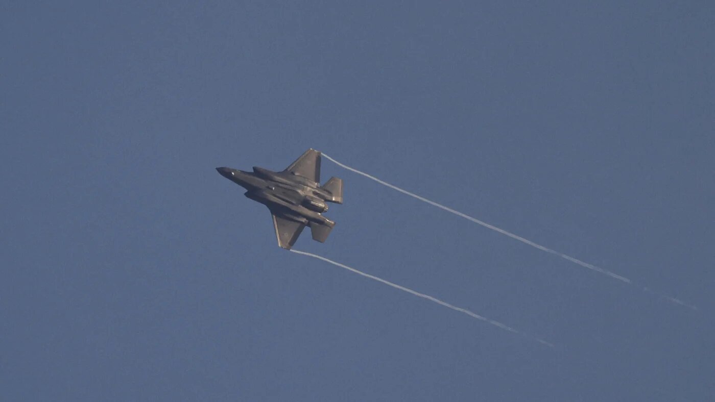 An Israeli fighter jet flying over the border area with south Lebanon on 7 July, 2024 (Jalaa Marey/AFP)