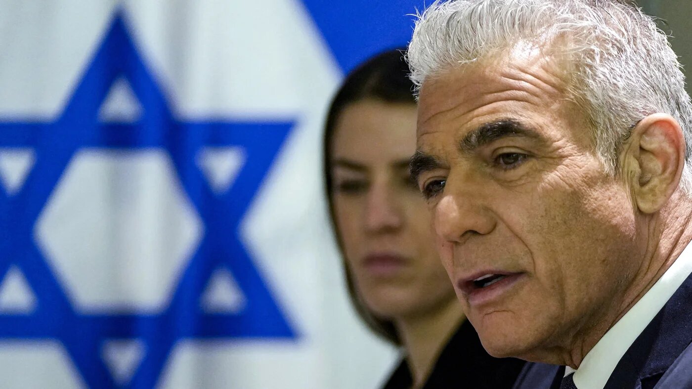 Israeli opposition leader Yair Lapid meets with the visiting US secretary of state in Tel Aviv on 8 February 2024 (AFP/Mark Schiefelbein)
