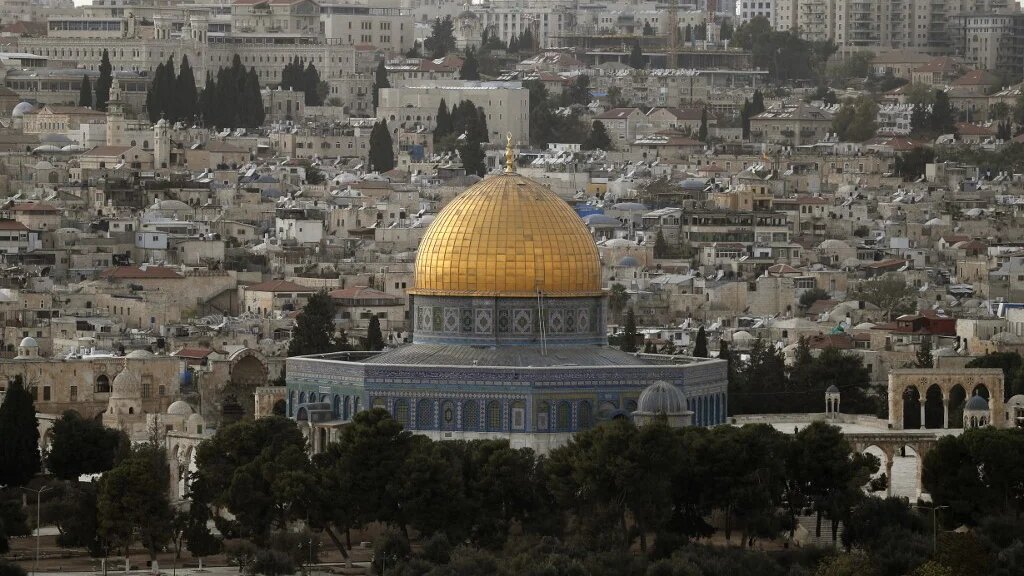 UK Prime Minister Liz Truss told Israeli Prime Minister Yair Lapid this week that she is considering moving the British embassy to occupied Jerusalem (AFP)