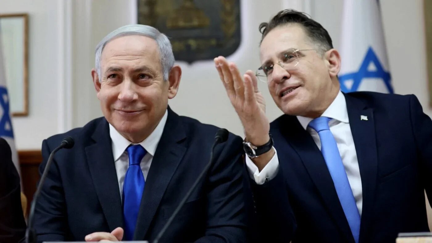 Israeli Prime Minister Benjamin Netanyahu listens to Tzachi Braverman at the start of the weekly cabinet meeting at his Jerusalem office on 17 November 2019 (AFP)