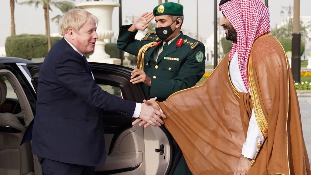 British Prime Minister Boris Johnson is welcomed by Saudi Arabia's Crown Prince Mohammed bin Salman to the kingdom this March (AFP)