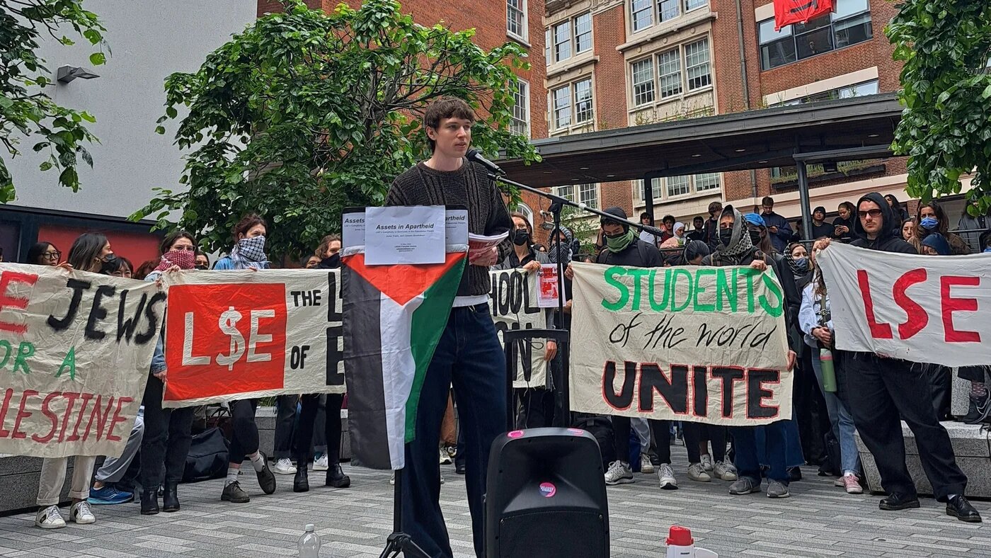 Students from the London School of Economics protesting against the university's investments in companies accused of profiting from Israeli war crimes (Supplied)