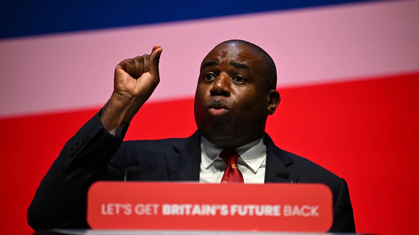 David Lammy addresses delegates on the second day of the annual Labour Party conference in Liverpool, on 9 October, 2023 (AFP)
